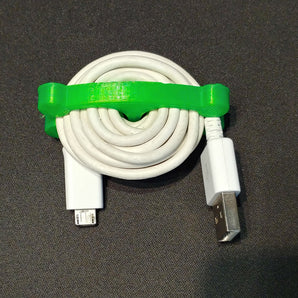 Kompakter USB-Kabelhalter und -wickler