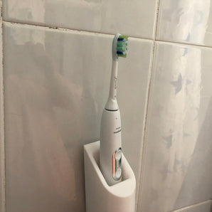 Wandmontierter Philips Sonicare Zahnbürstenhalter mit Ladegerät