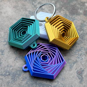 Sechseckiger Fidget-Schlüsselanhänger