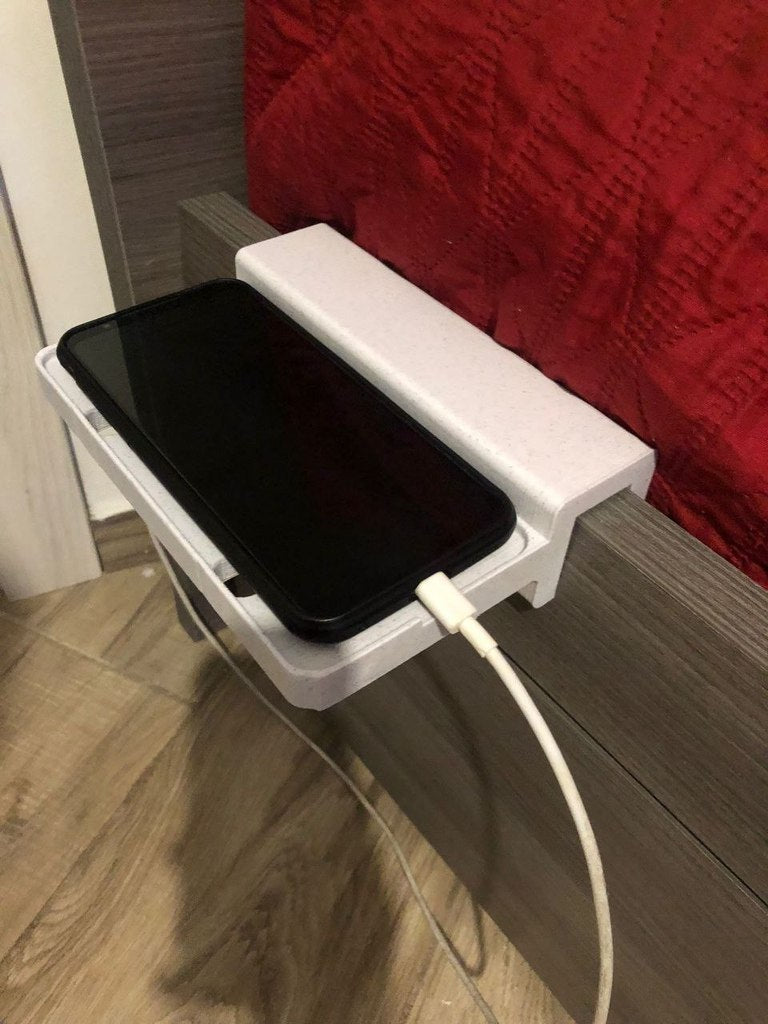 Universelle Telefonablage am Bett