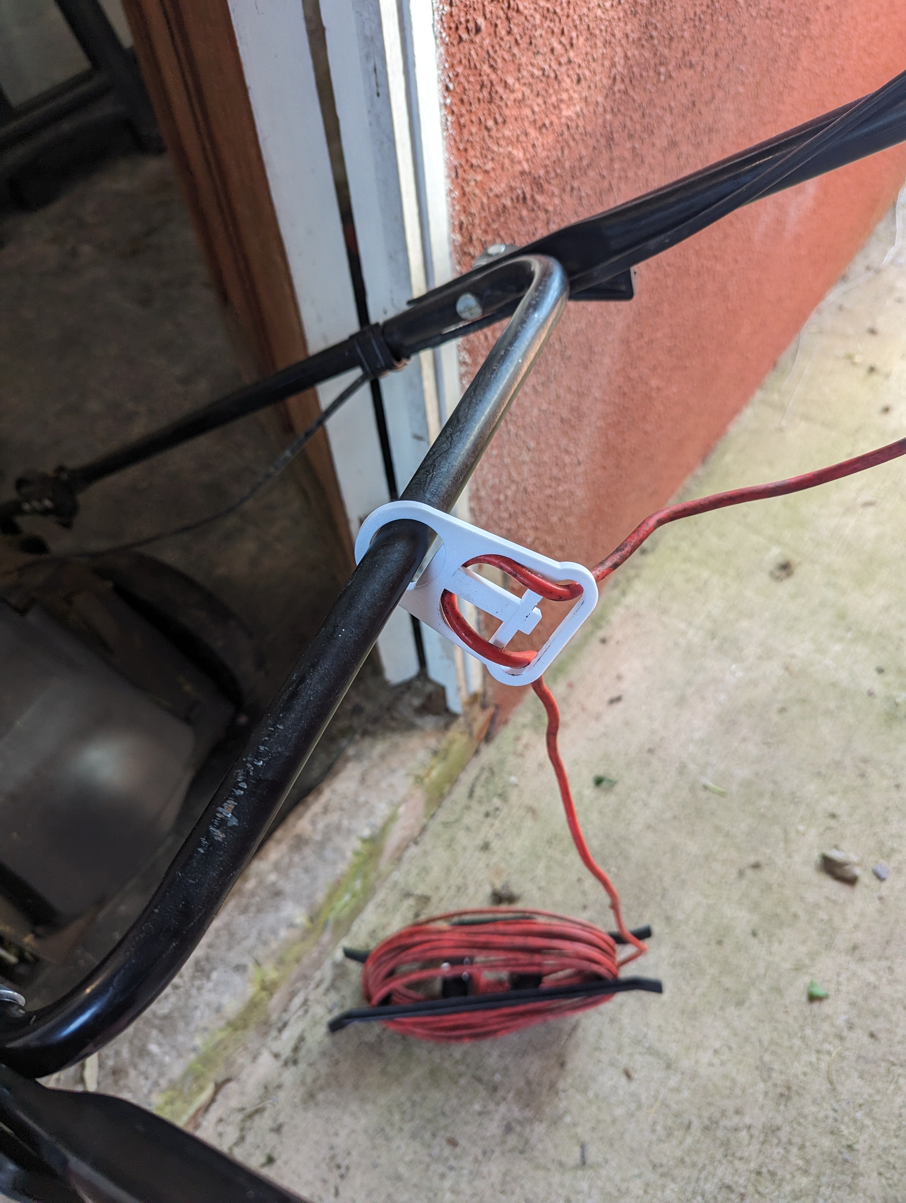 Kabelhalter für Elektrorasenmäher