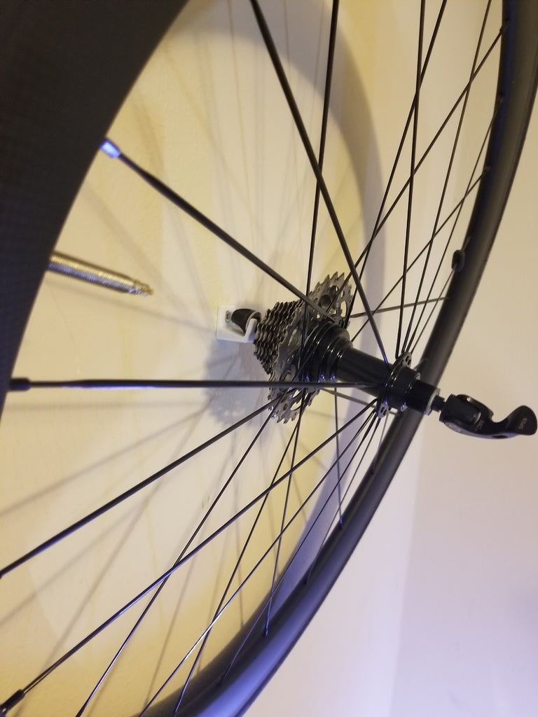 Wandhalterung für Rennrad-Laufräder